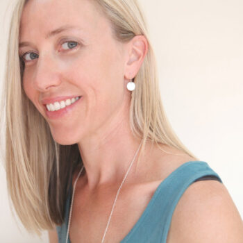 coin-dot-earring-on-model- simple coin next romance jewellery