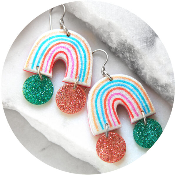 pink teal pastel rainbow art earrings with glitter at the end of the rainbow next romance jewellery designs