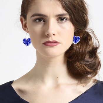 blue ceramic heart hoop on model earrings
